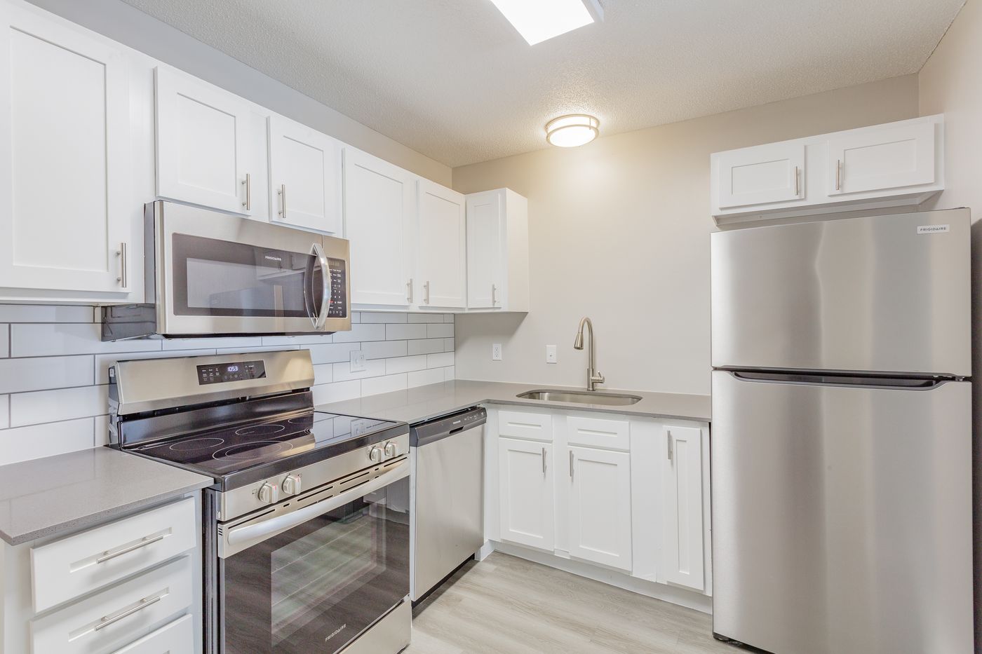 Kitchen with white cabinets